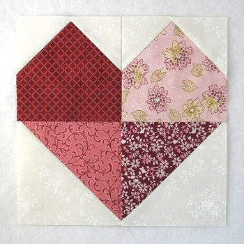 four patch scrappy heart quilt block